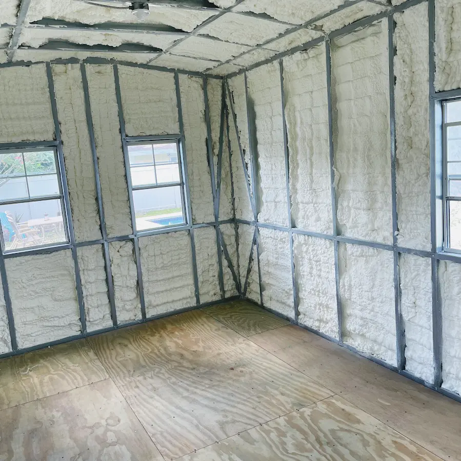 Closed-cell spray foam insulation applied to wall cavities in a residential project in Groesbeck