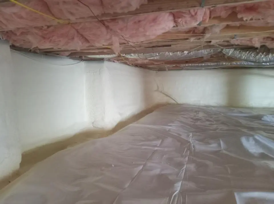 Crawl space encapsulation with closed-cell spray foam for Commercial Roof Restoration in Groesbeck